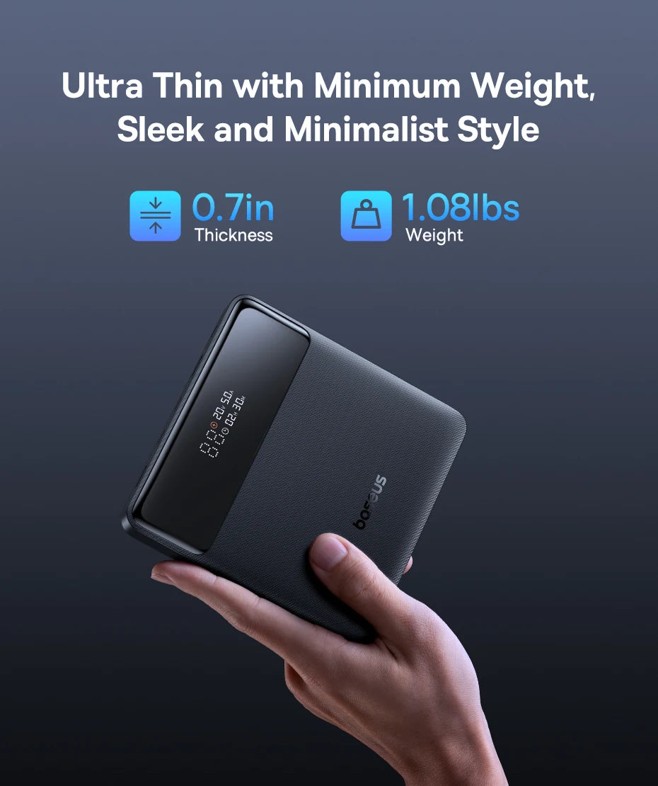 Hand holding a thin electronic power bank device with specifications on a dark background
