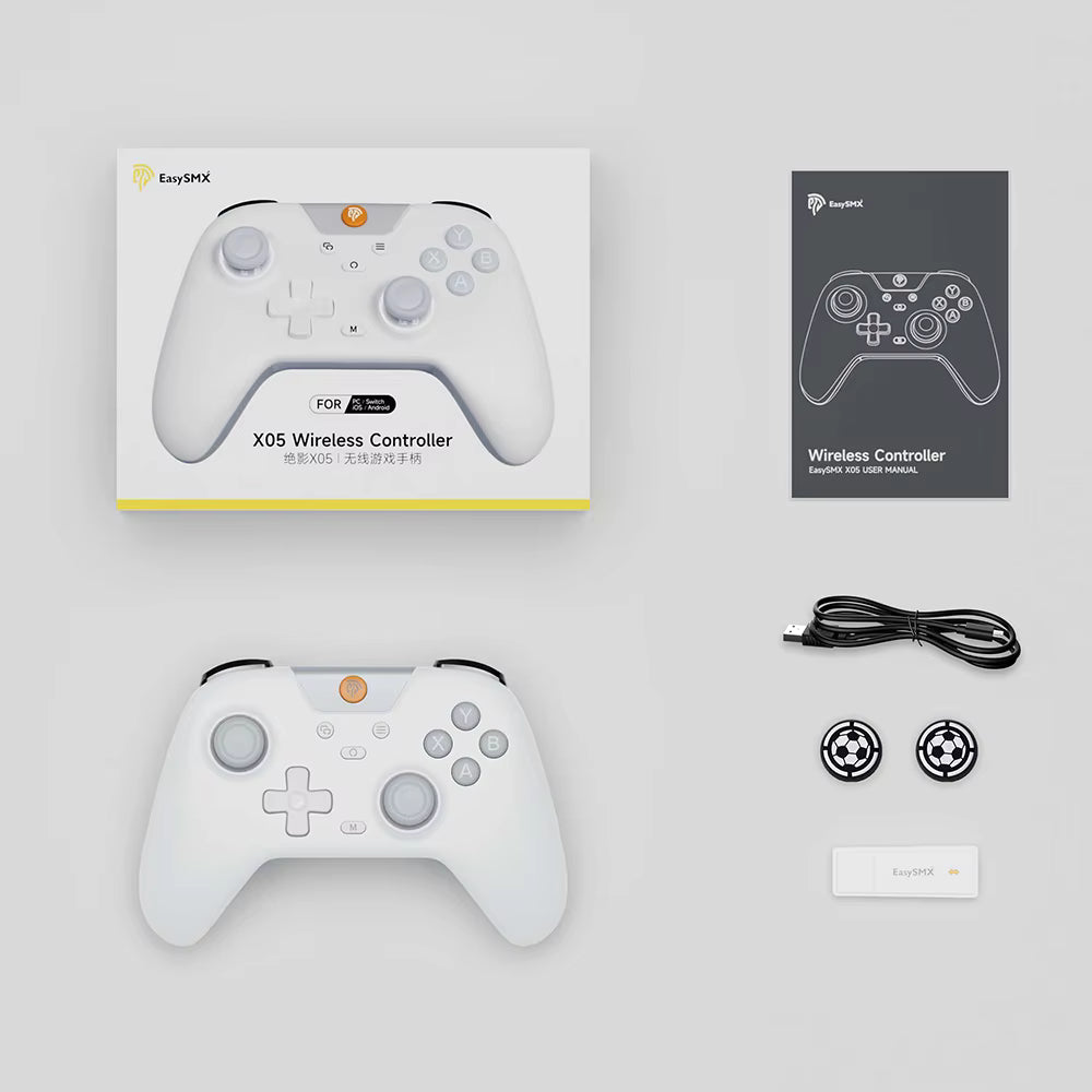 Flat‑lay of EasySMX X05 controller with box, USB‑C cable, manual, joystick caps and wireless receiver.