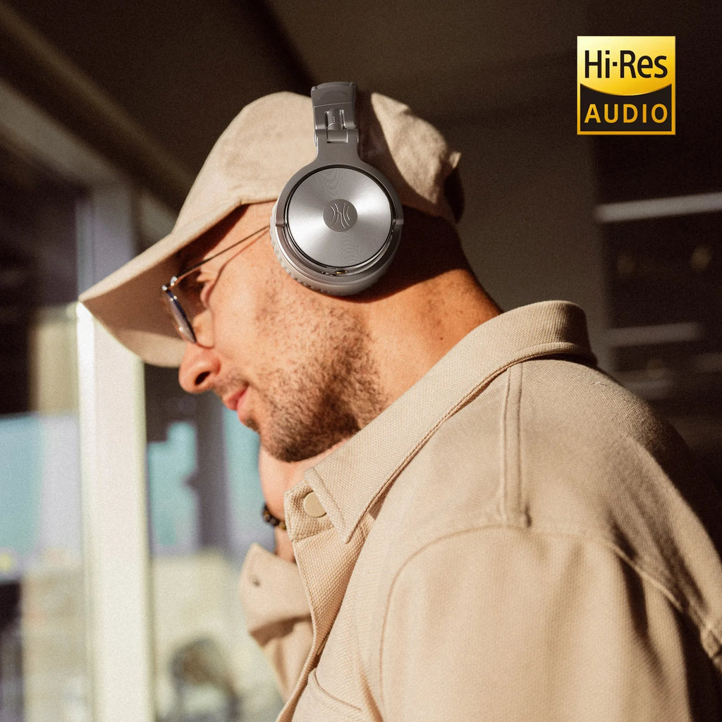 Man wearing headphones with 'Hi-Res Audio' logo in the corner