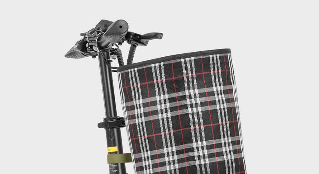 Plaid-patterned bag with metal clasp on a light gray background  DYU A1F Pro Folding E-Bike 