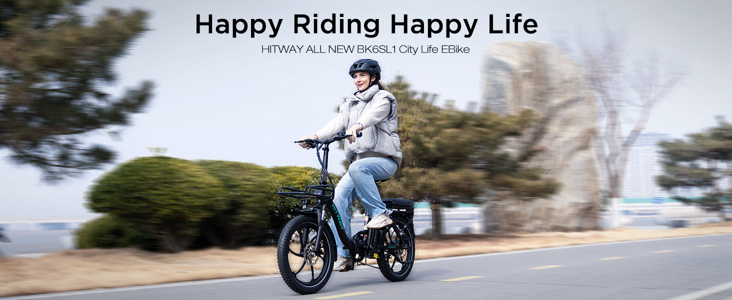 Person riding a Hitway electric bike on a road with trees and blurred background