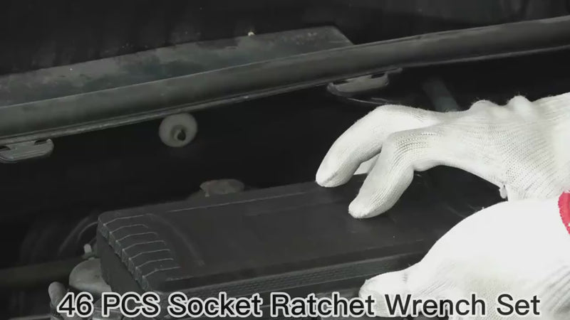 Mechanic using 1/4 inch ratchet socket wrench to repair car engine compartment