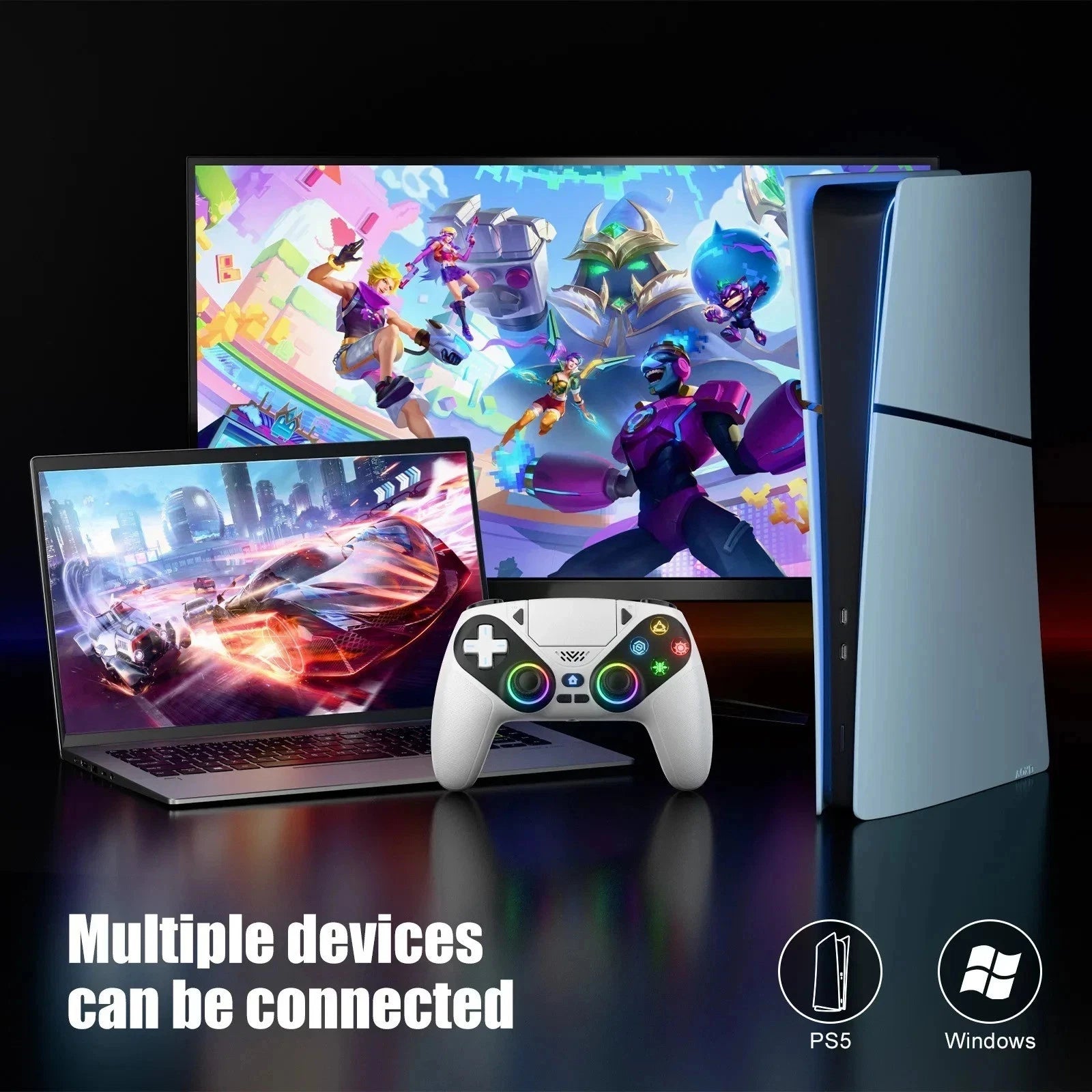 Gaming console, laptop, and controller with gaming graphics on screens.
