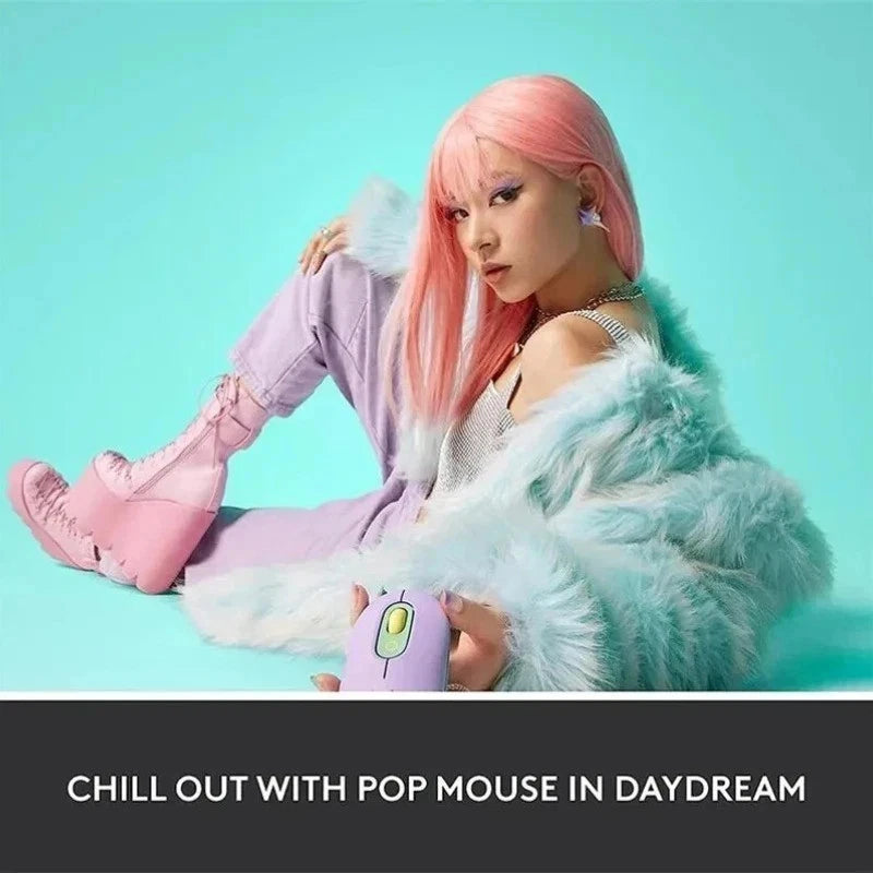 Person with pink hair and pastel outfit holding a plush toy against a light blue background